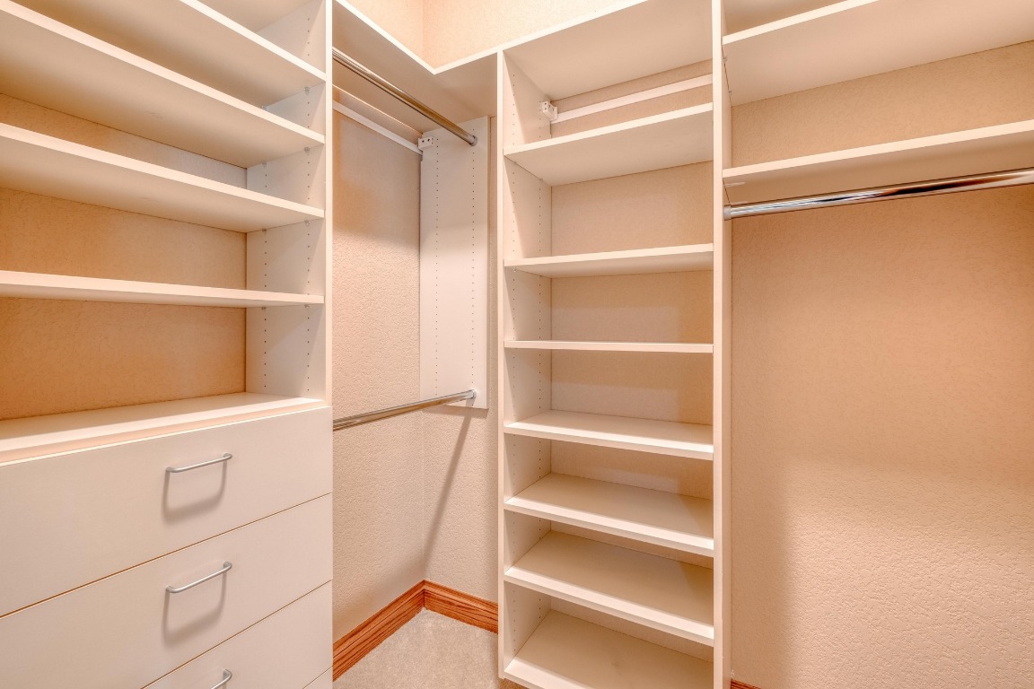 205 Flint Ridge Trail Georgetown, TX 78628 - Photo 26 of 40 a view of an empty walk in closet