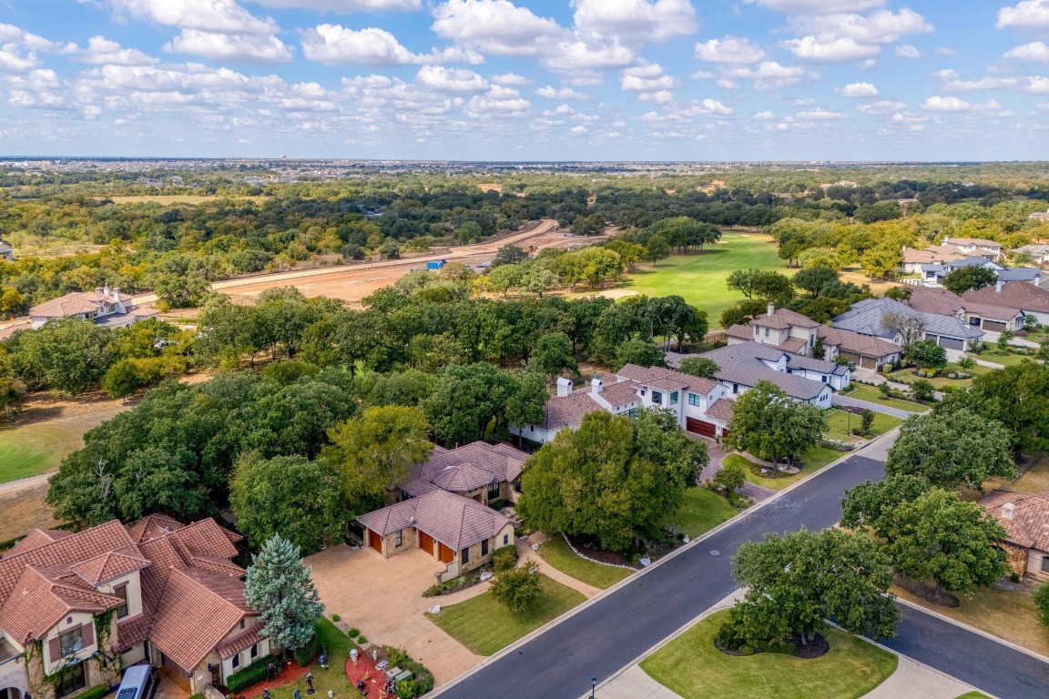 205 Flint Ridge Trail Georgetown, TX 78628 - Photo 39 of 40 an aerial view of residential houses with outdoor space and lake view
