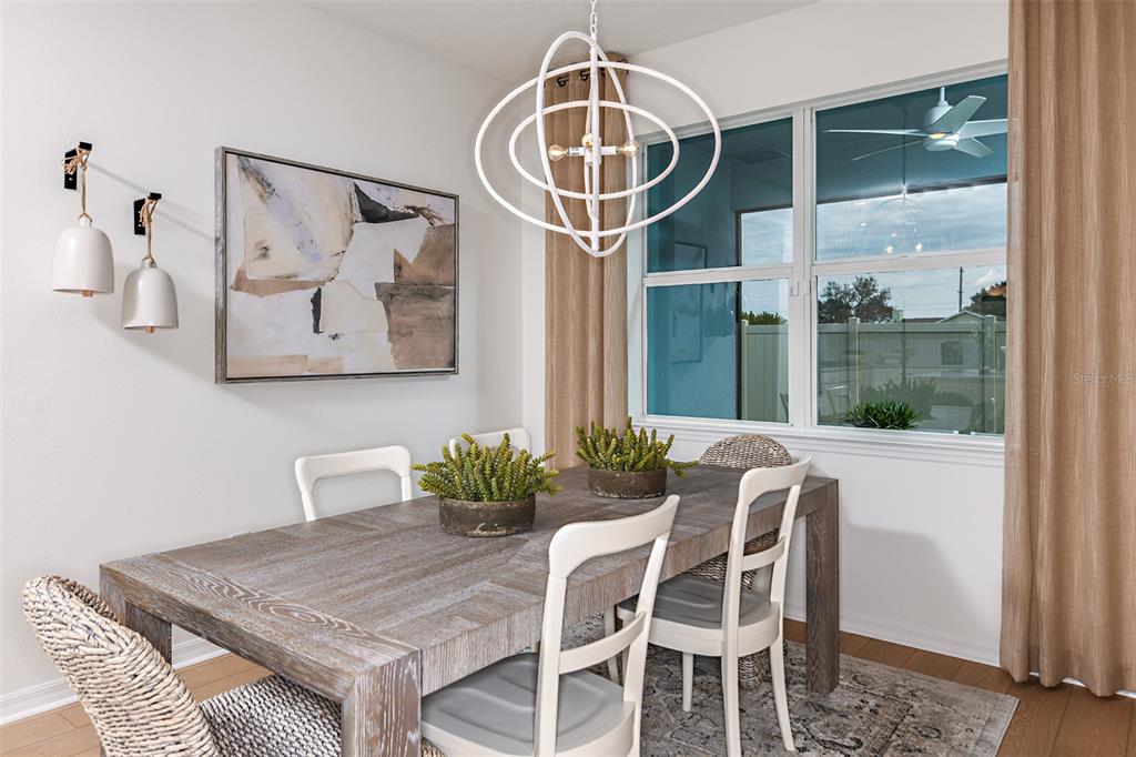 3709 Obsidian Drive Spring Hill, FL 34609 - Photo 6 of 19 a dining room with furniture and window