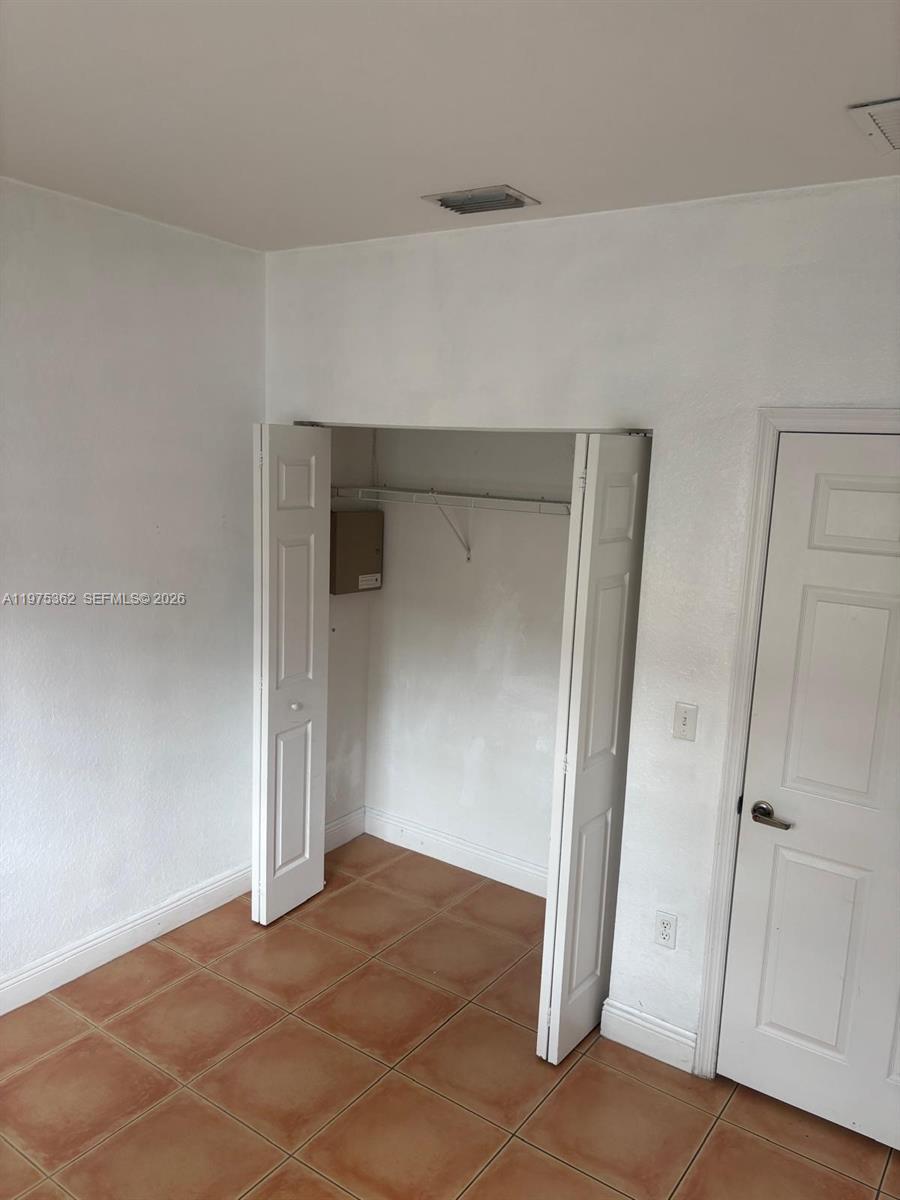 371 Northeast 26th Terrace, Unit 101 Homestead, FL 33033 - Photo 6 of 10 a view of an empty room