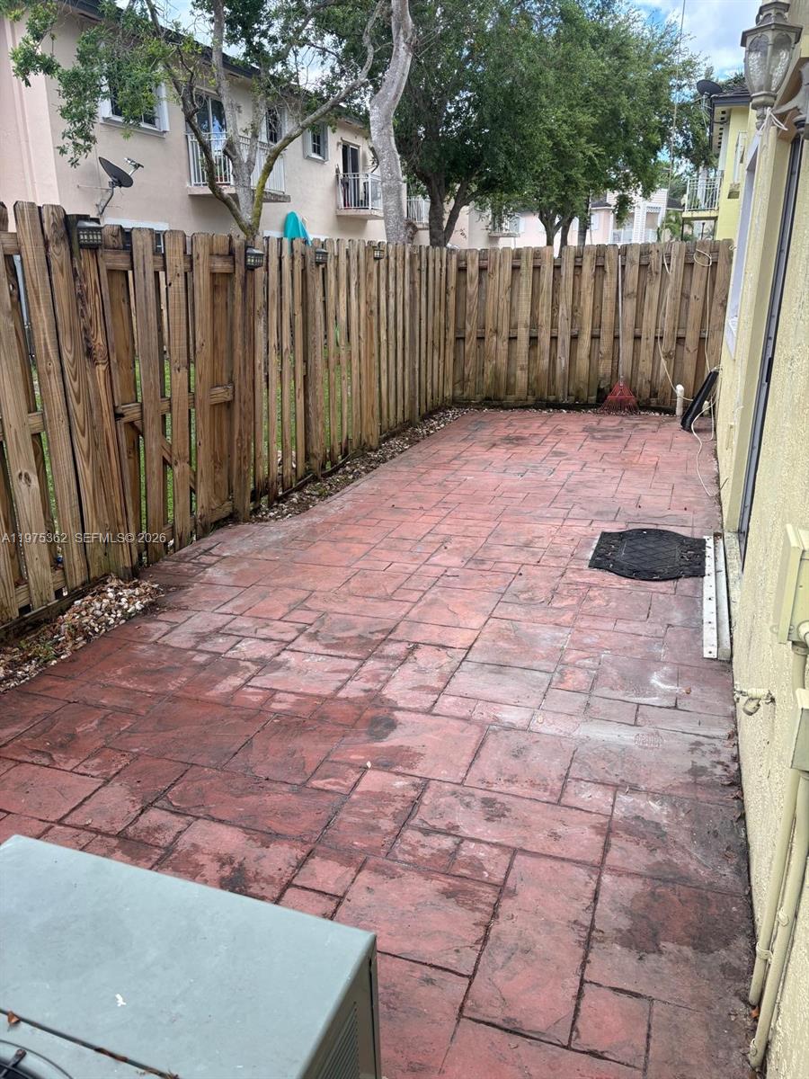 371 Northeast 26th Terrace, Unit 101 Homestead, FL 33033 - Photo 9 of 10 a view of a backyard
