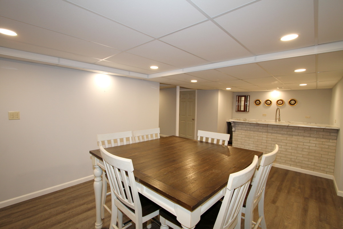 2165 Hidden Valley Drive Naperville, IL 60565 - Photo 23 of 29 a view of a dining room with furniture