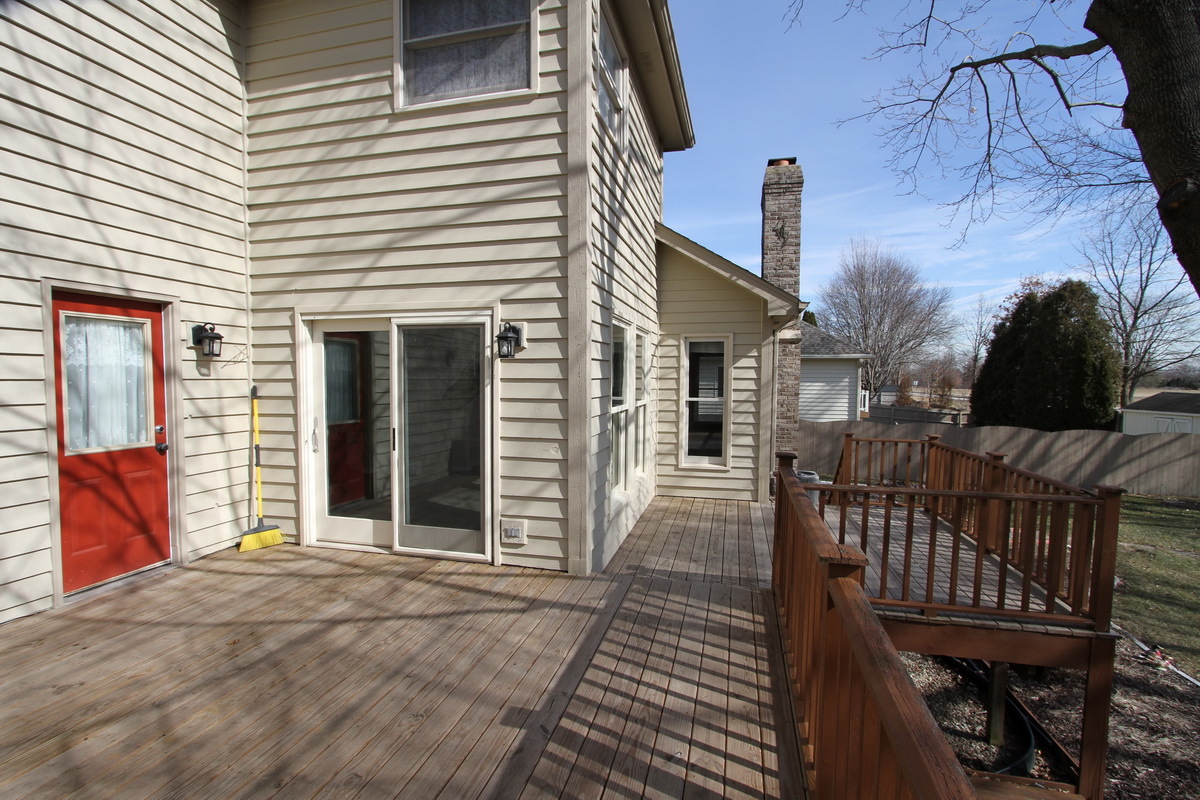 2165 Hidden Valley Drive Naperville, IL 60565 - Photo 24 of 29 a view of a house with wooden deck