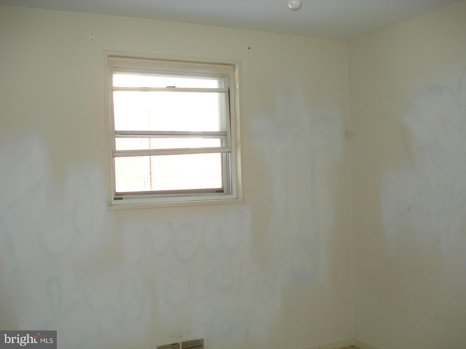 3525 Harrell Street Silver Spring, MD 20906 - Photo 4 of 24 a view of a window in an empty room