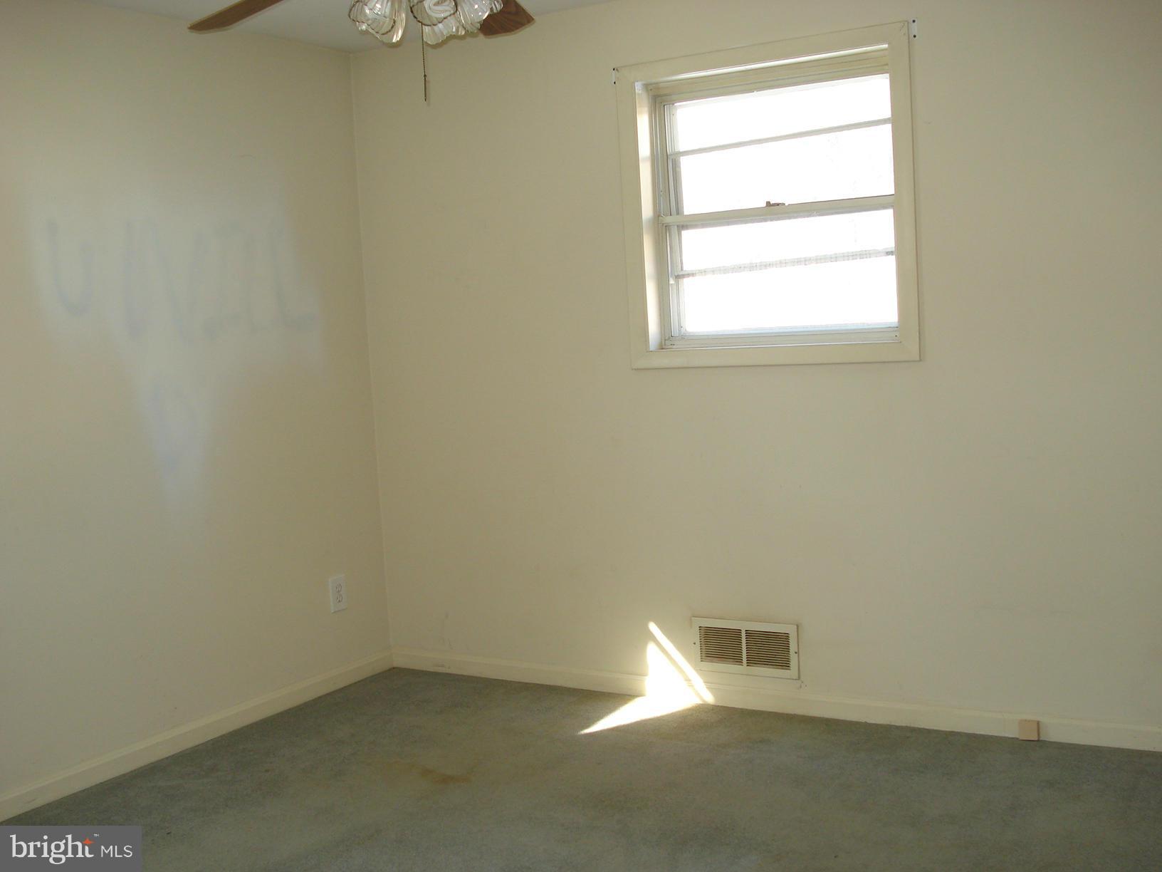 3525 Harrell Street Silver Spring, MD 20906 - Photo 6 of 24 an empty room with a window