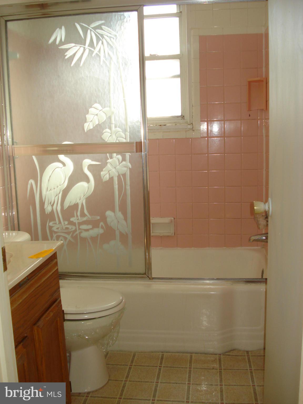 3525 Harrell Street Silver Spring, MD 20906 - Photo 10 of 24 a bathroom with a toilet and a shower