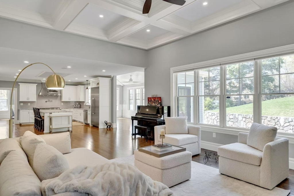 311 Concord Avenue Lexington, MA 02421 - Photo 14 of 28 a living room with furniture and a flat screen tv