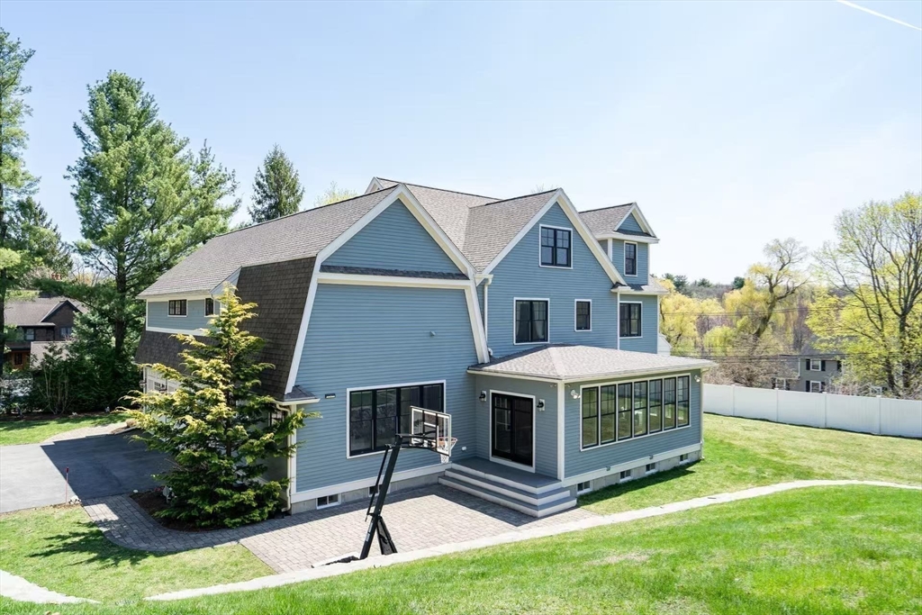 311 Concord Avenue Lexington, MA 02421 - Photo 28 of 28 a front view of a house with garden