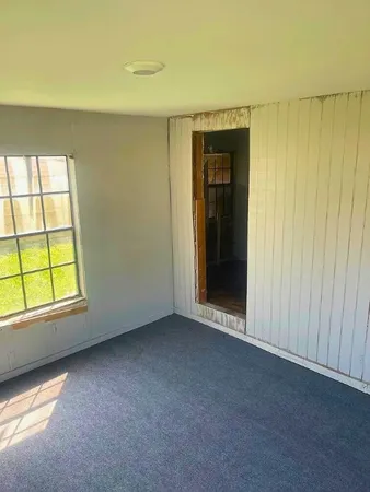 an empty room with a window
