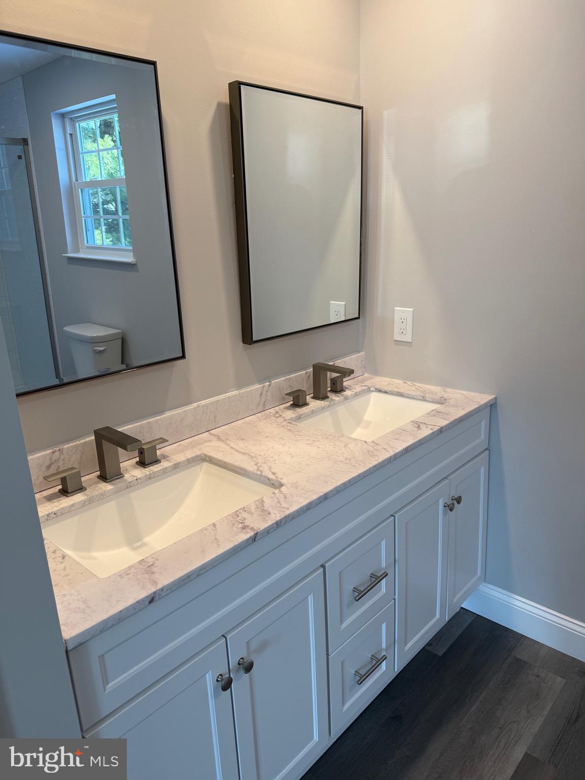 204 3rd Avenue West Berlin, NJ 08091 - Photo 11 of 19 a bathroom with a sink vanity and mirror