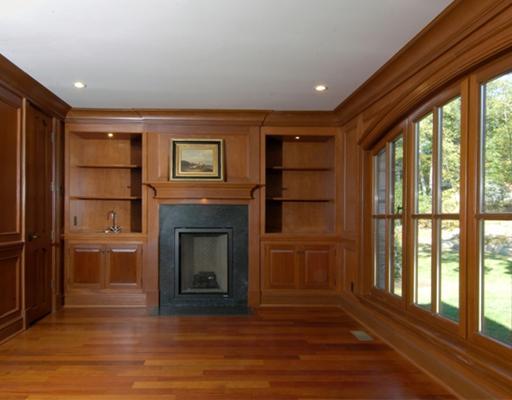 Undisclosed Address Cos Cob, CT 06807 - Photo 7 of 10 a view of a livingroom with an empty space and a fireplace