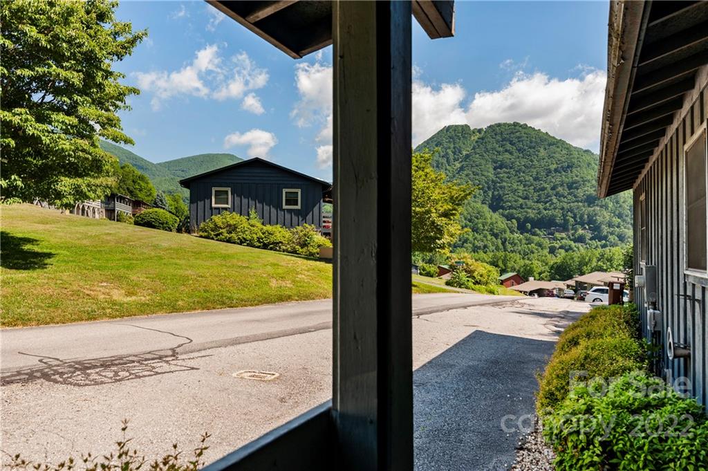 400 Stoney Ridge Loop Maggie Valley, NC 28751 - Photo 3 of 15 a view of a yard from a balcony