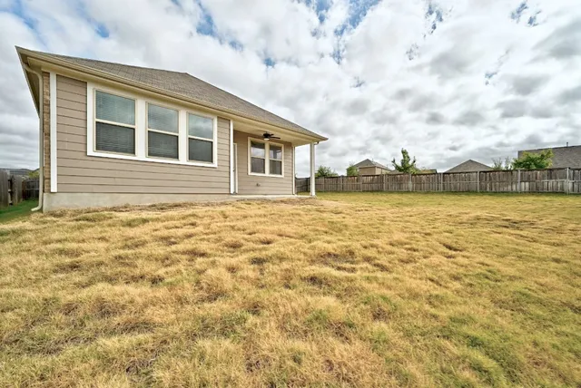 a front view of house with yard