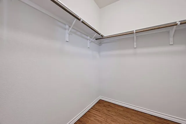 a view of a room with racks on the wall