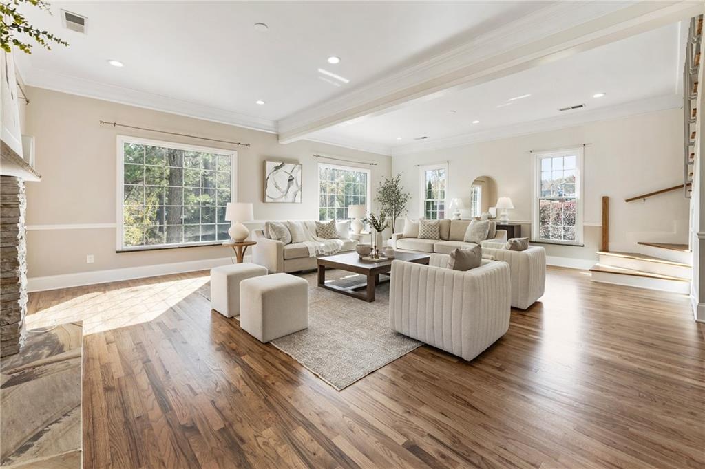 14440 Cogburn Road Alpharetta, GA 30004 - Photo 19 of 62 a living room with furniture and a large window