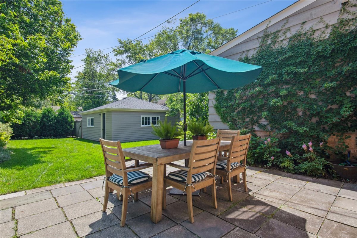 2429 Prospect Avenue Evanston, IL 60201 - Photo 25 of 31 a view of a table and chairs under an umbrella