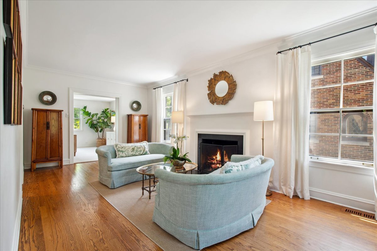 2429 Prospect Avenue Evanston, IL 60201 - Photo 5 of 31 a living room with furniture and a fireplace