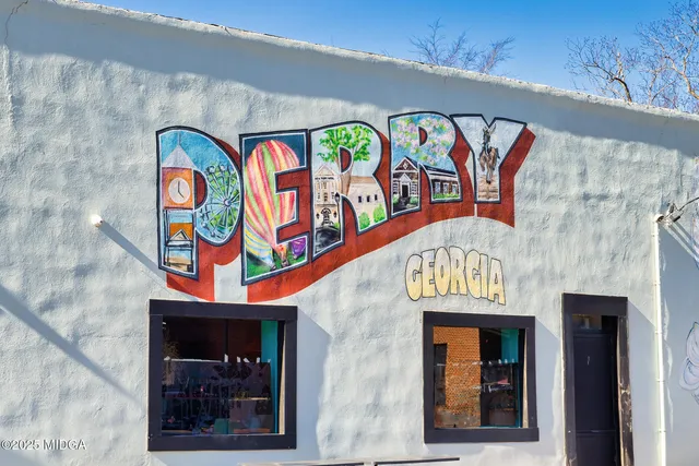 a sign on the wall of building