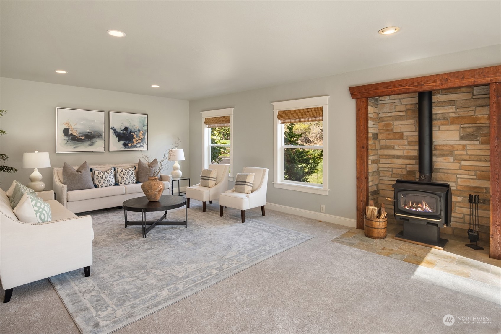 23702 34th Avenue Southeast Bothell, WA 98021 - Photo 12 of 35 a living room with furniture and a fireplace