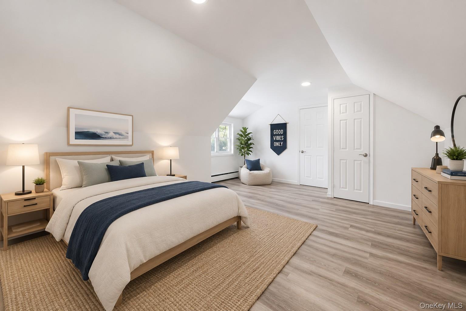 785 Locksley Road Yorktown Heights, NY 10598 - Photo 9 of 16 Bright room featuring sloped ceilings, recessed lighting, wood-finish flooring, two paneled doors, and a window photos have been digitally enhanced to illustrate the property's potential.