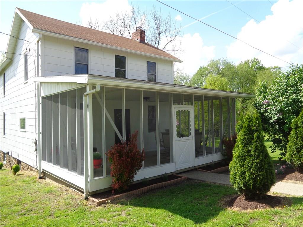 147 Grimplin Road Vanderbilt, PA 15486 - Photo 2 of 25 COUNTRY CHARMER - SCREENED IN FRONT PORCH