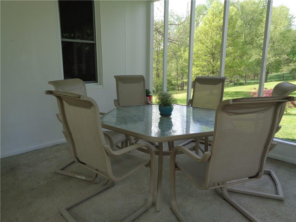 147 Grimplin Road Vanderbilt, PA 15486 - Photo 3 of 25 SCREENED IN FRONT PORCH