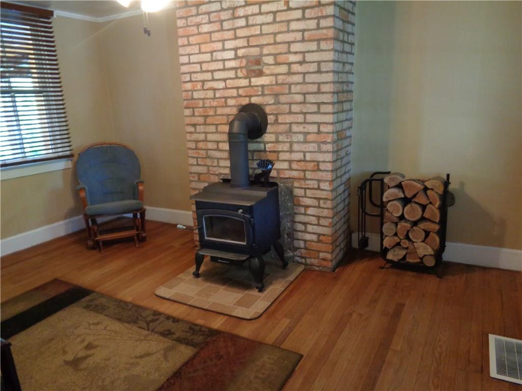 147 Grimplin Road Vanderbilt, PA 15486 - Photo 8 of 25 DINING ROOM W/WOOD BURNER