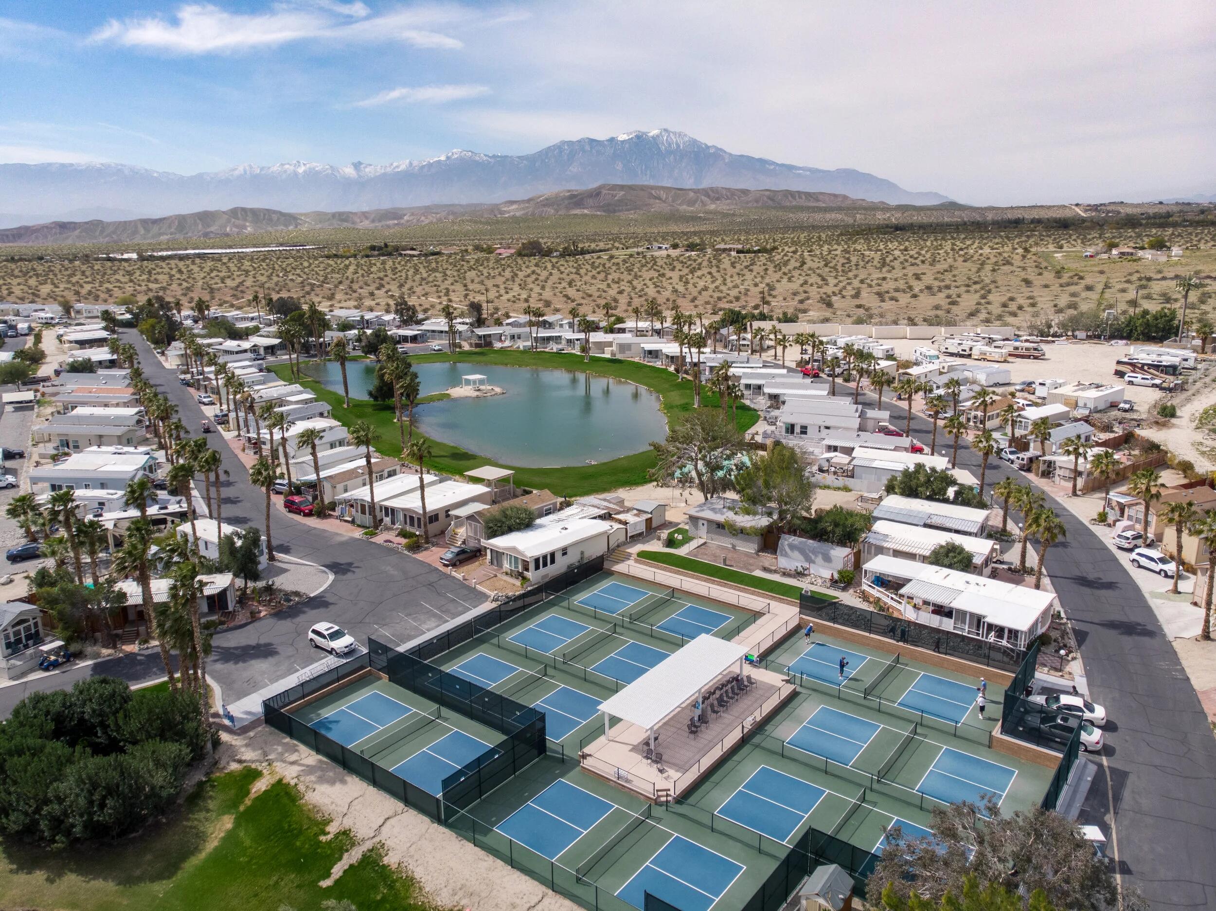 74711 Dillon Road, Unit 392 Desert Hot Springs, CA 92241 - Photo 41 of 46 an aerial view of a house with a lake view