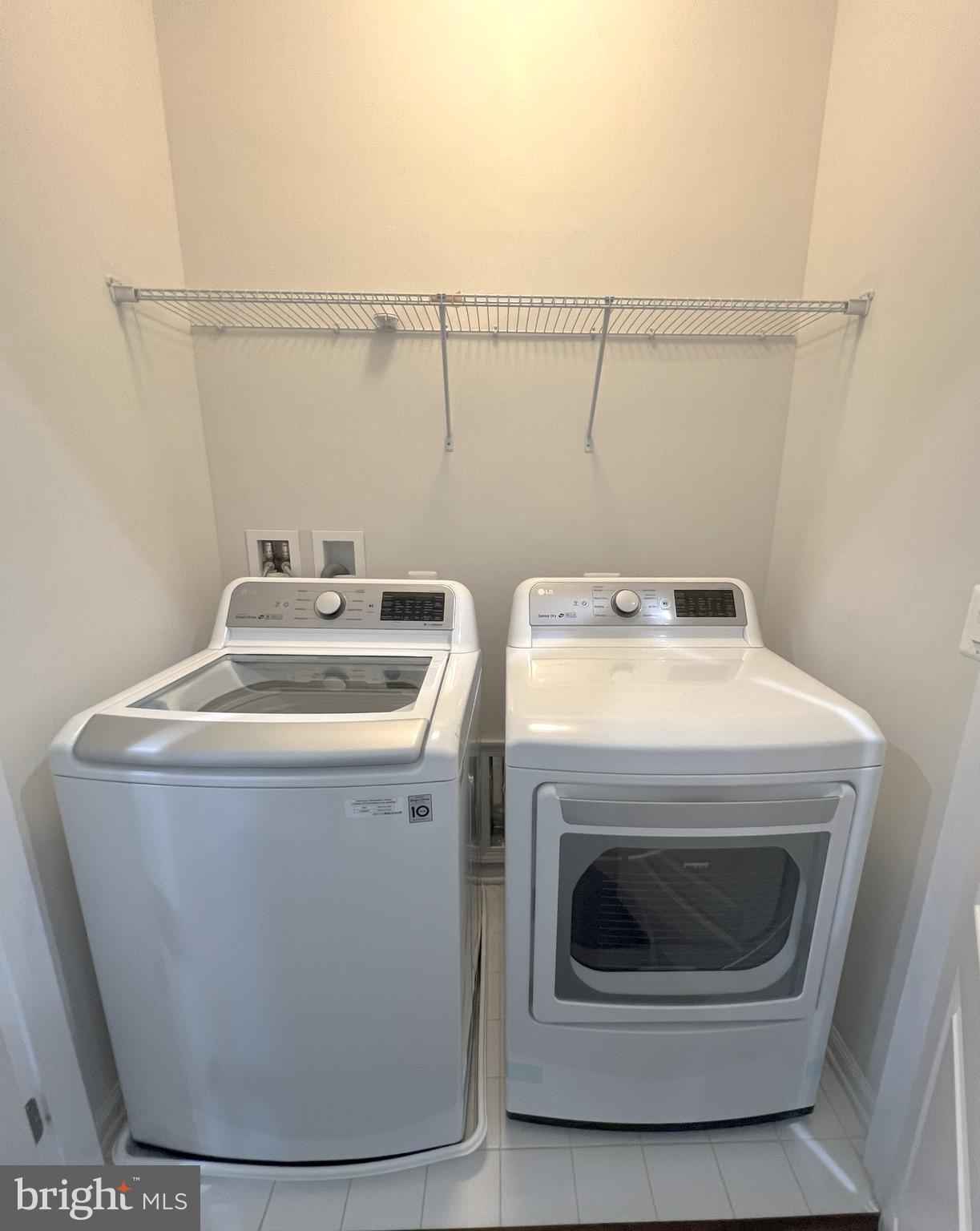 3092 Alan Shepard Street Herndon, VA 20171 - Photo 30 of 45 a utility room with dryer and washer