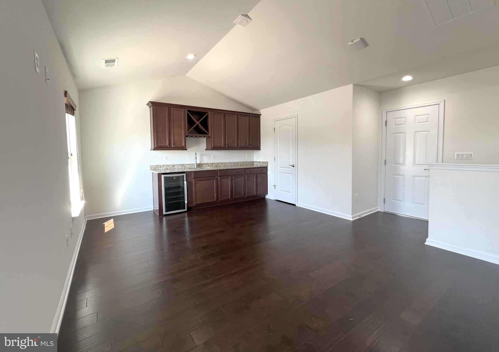 3092 Alan Shepard Street Herndon, VA 20171 - Photo 32 of 45 a view of kitchen with stainless steel appliances wooden floor and cabinets