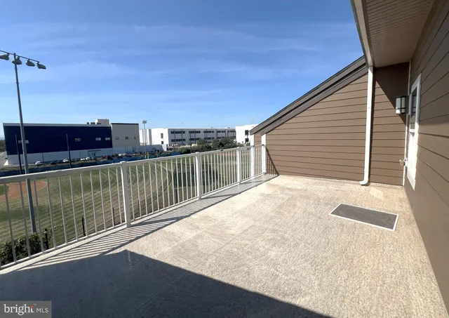 a balcony with view of city