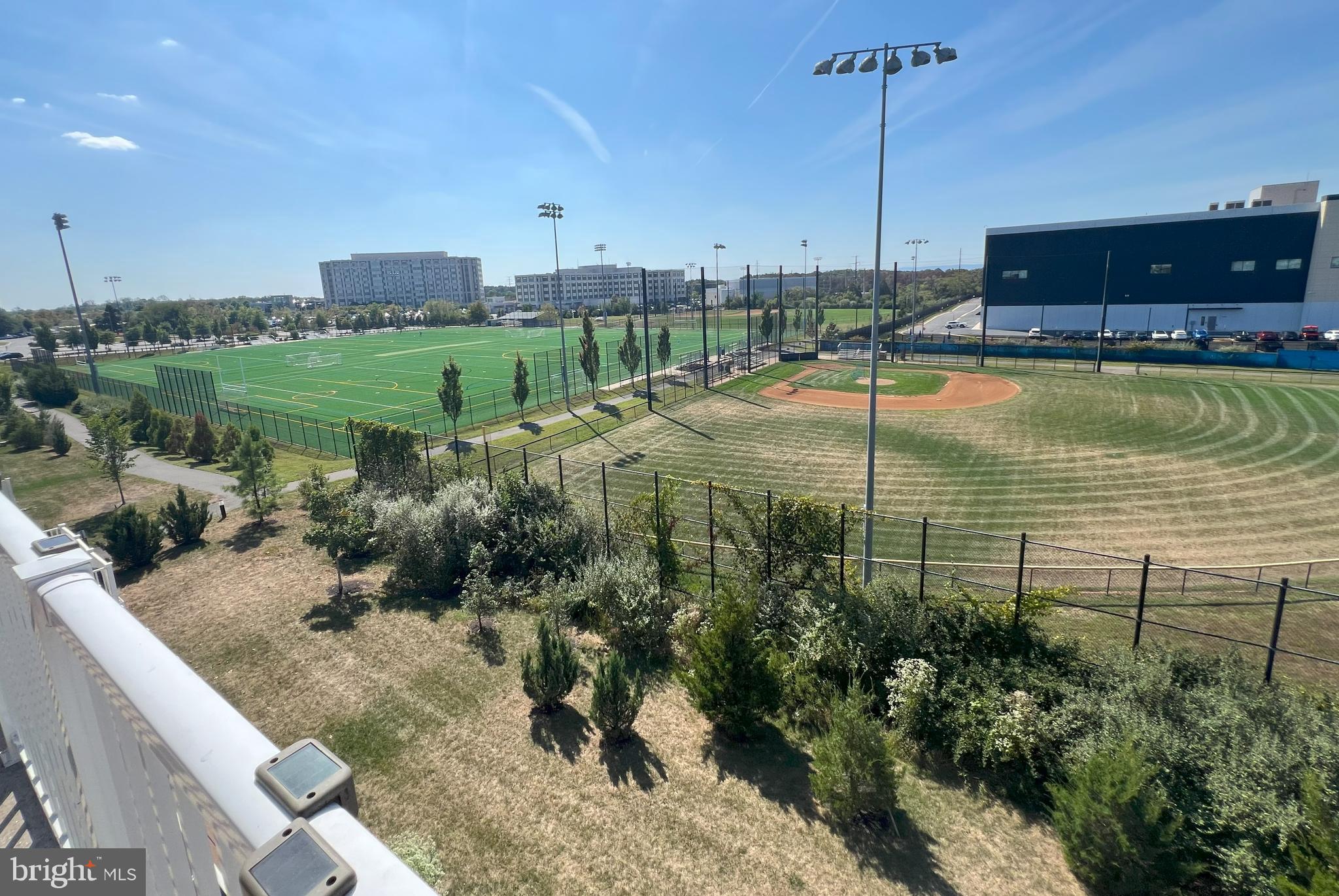3092 Alan Shepard Street Herndon, VA 20171 - Photo 38 of 45 a view of a swimming pool with a yard