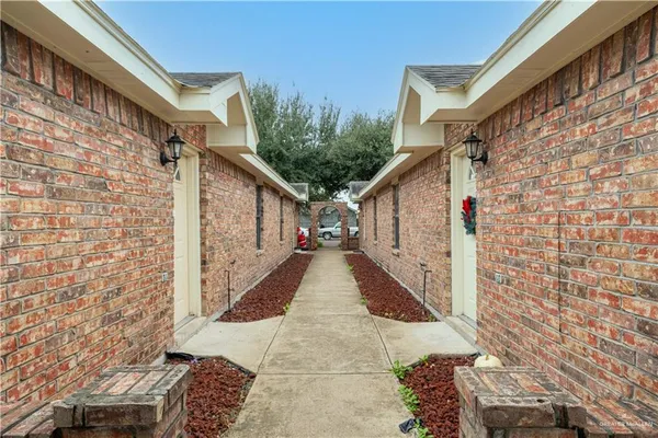 a view of a pathway with a house