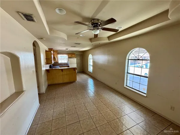 a view of a hallway with windows