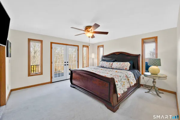 a view of a hallway view with three rooms