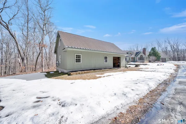 an outdoor space with lots of swings and slides