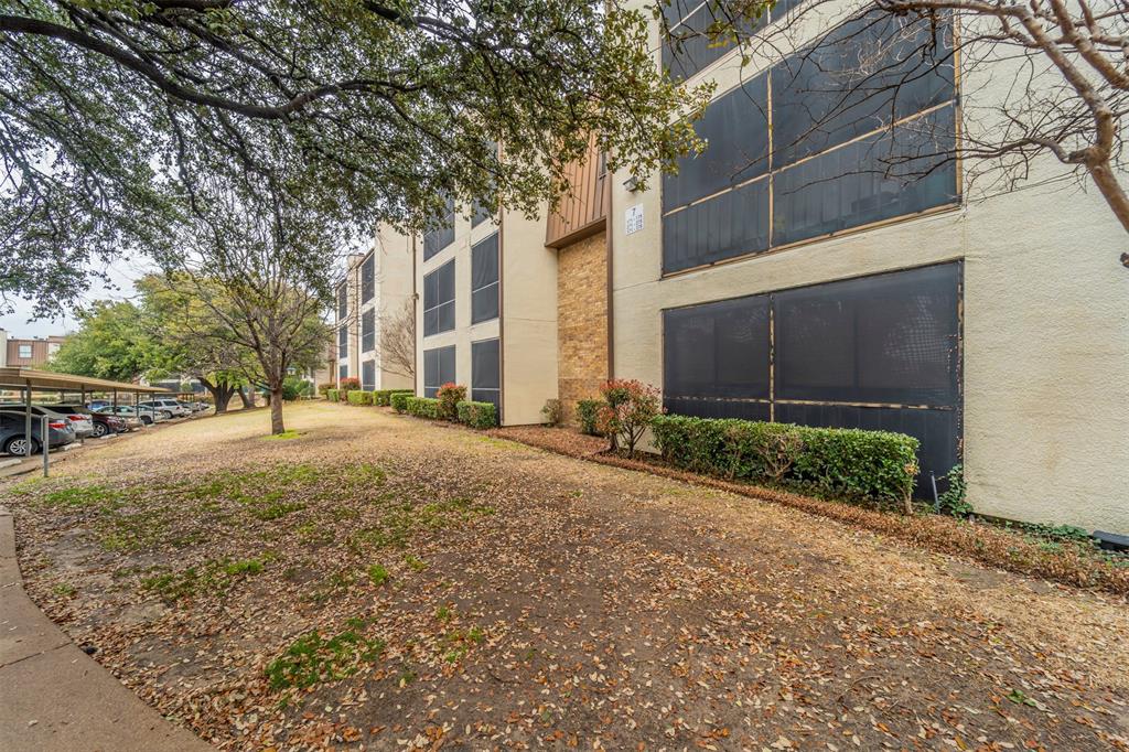 11460 Audelia Road, Unit 278 Dallas, TX 75243 - Photo 1 of 1 a house with trees in front of it