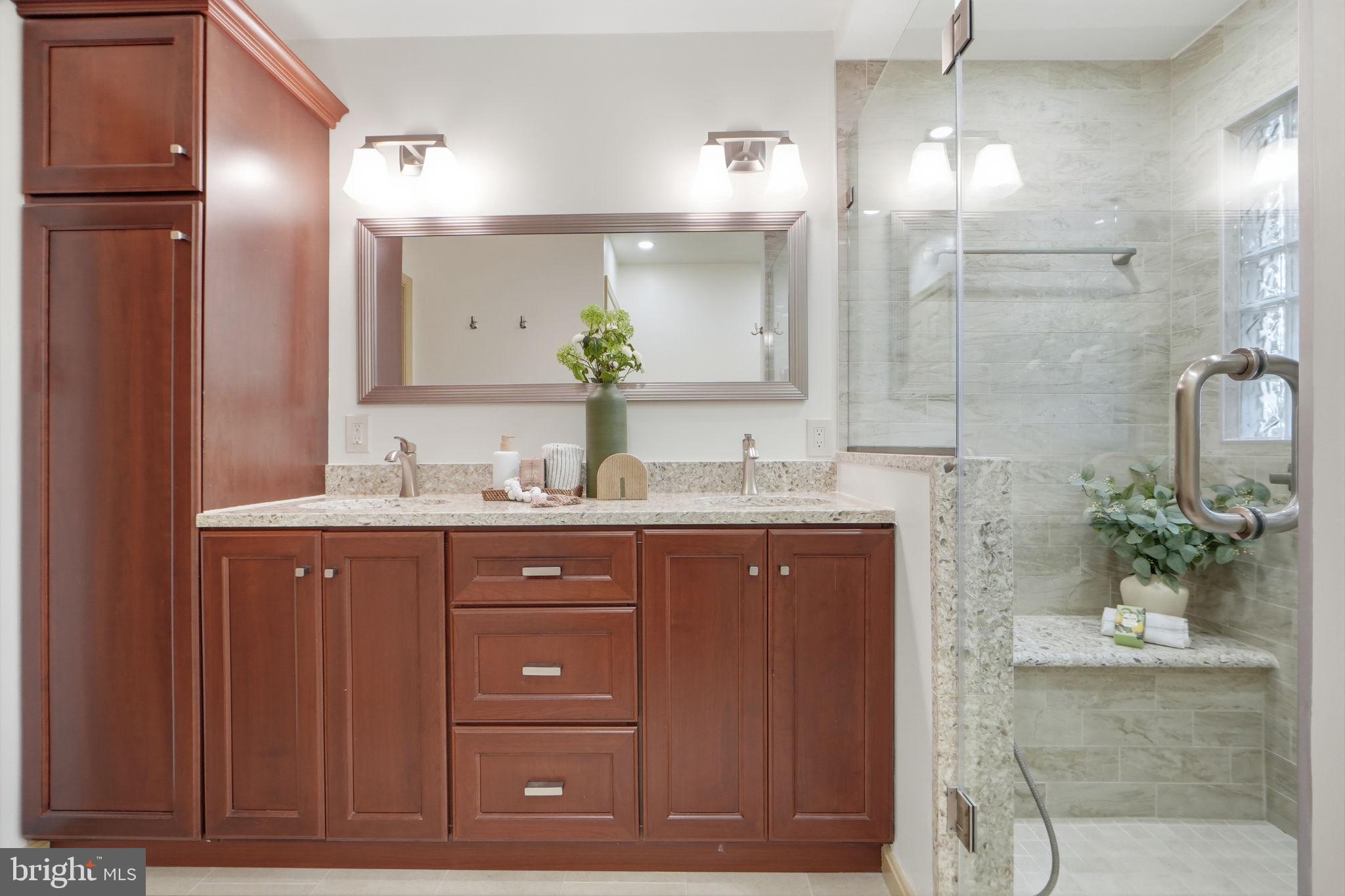 13702 Springstone Court Clifton, VA 20124 - Photo 25 of 50 Gorgeous vanity, tile shower, and extra storage