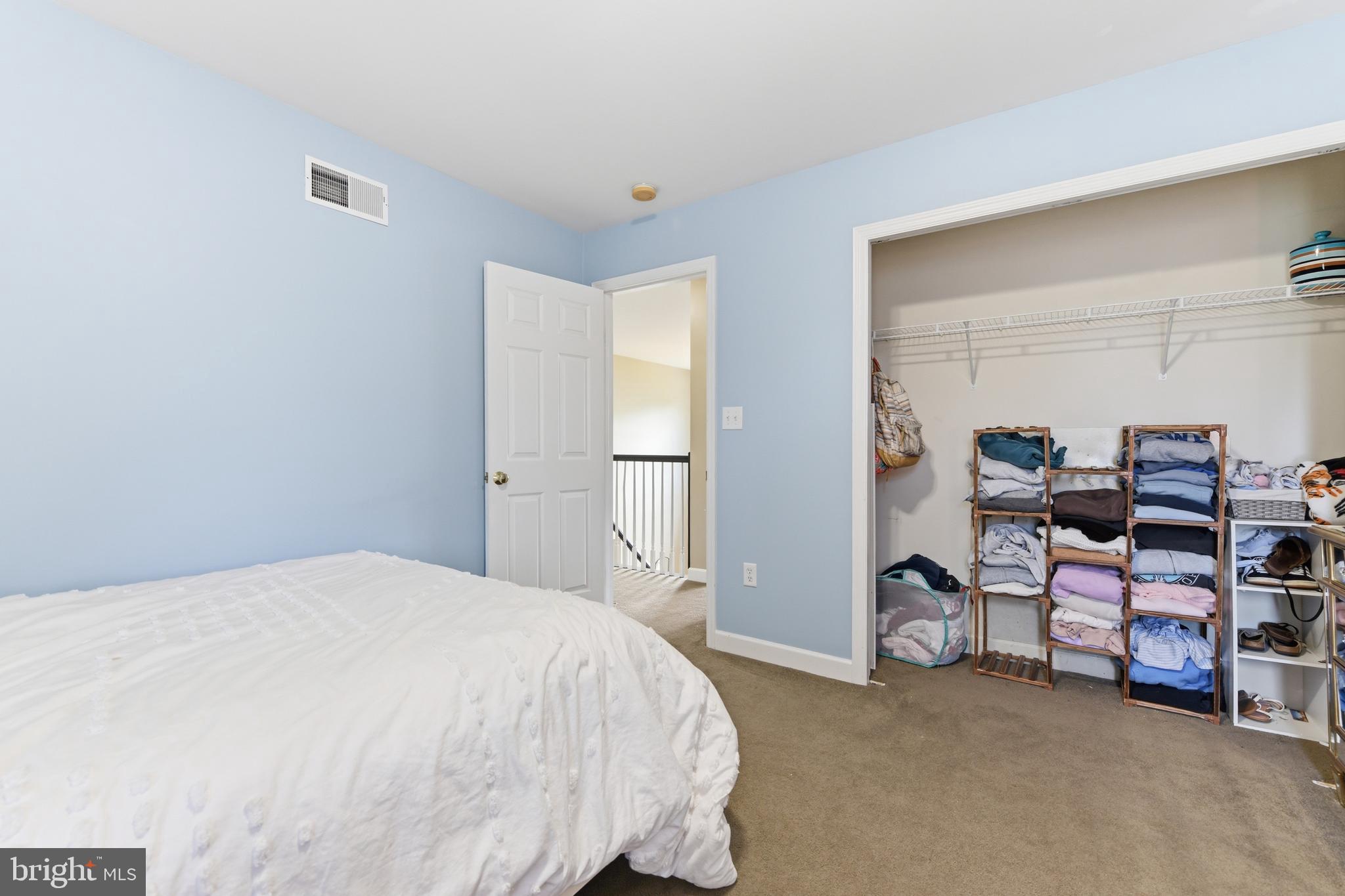 3121 South Wagner Circle Sinking Spring, PA 19608 - Photo 23 of 30 a spacious bedroom with a bed and a cabinets