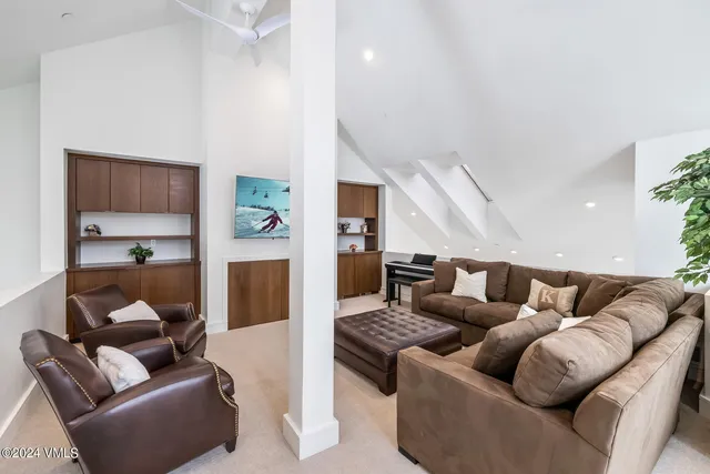 a living room with furniture and a couch