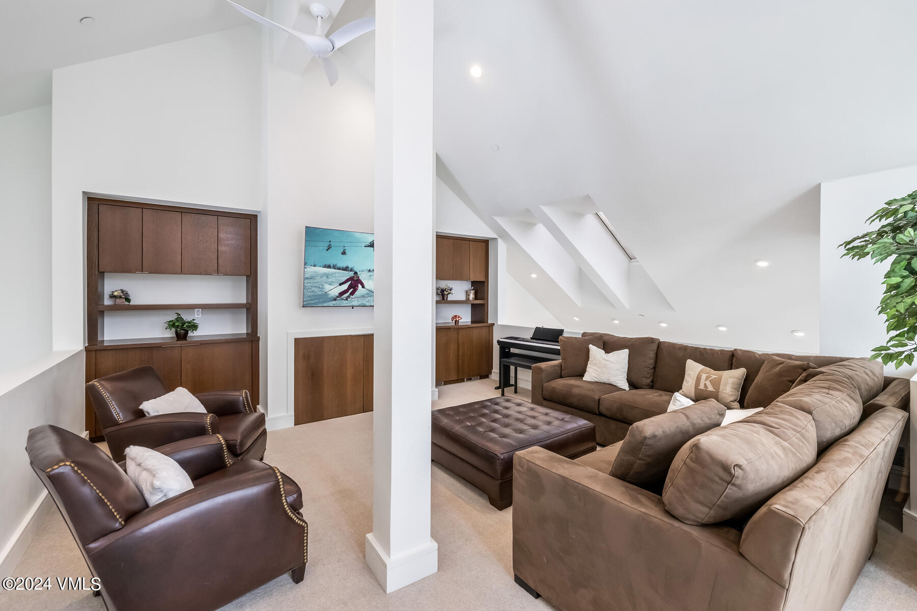 83 Offerson Road, Unit 1 Beaver Creek, CO 81620 - Photo 21 of 27 a living room with furniture and a couch