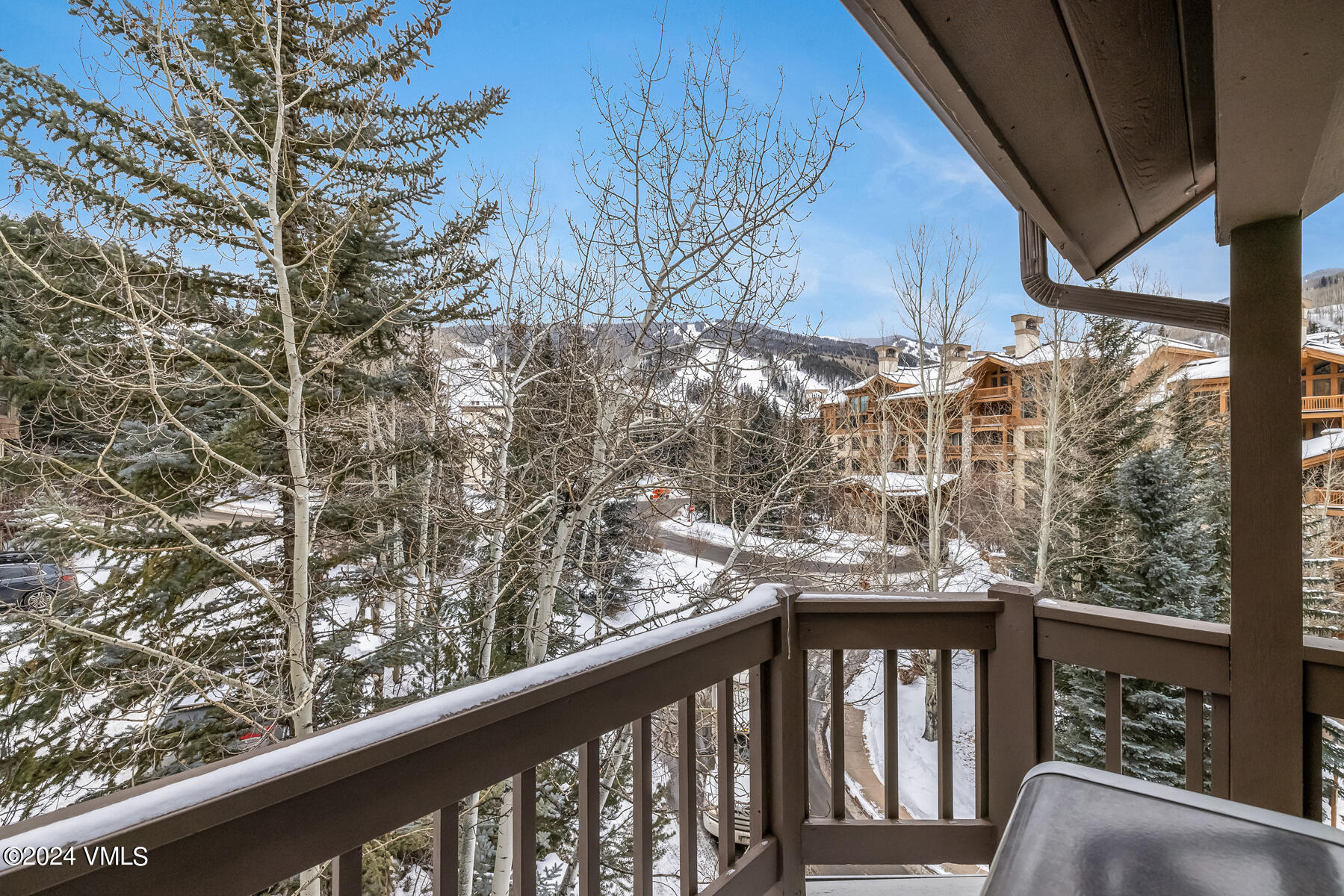 83 Offerson Road, Unit 1 Beaver Creek, CO 81620 - Photo 23 of 27 a view of a balcony with wooden fence