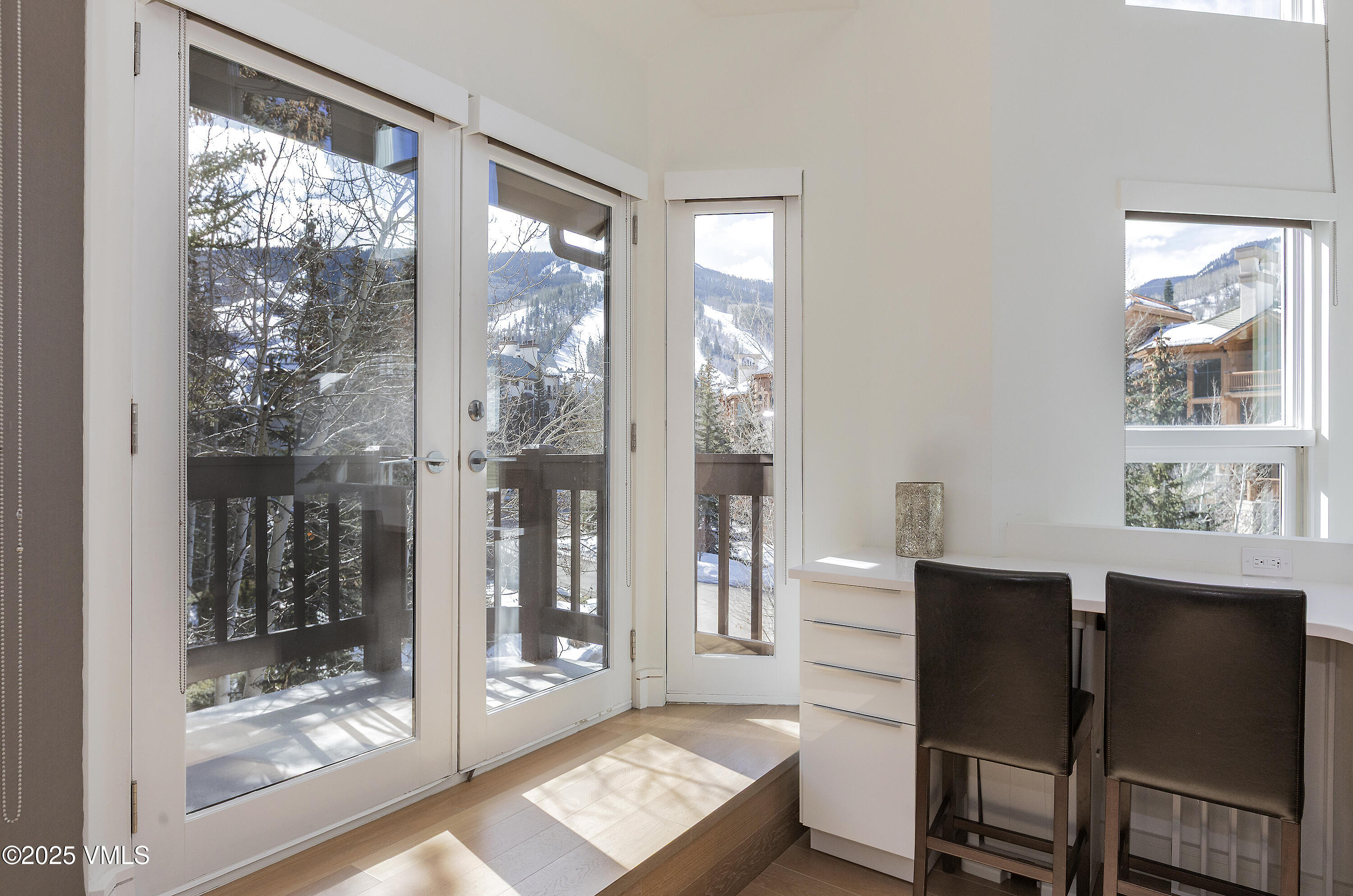 83 Offerson Road, Unit 1 Beaver Creek, CO 81620 - Photo 26 of 27 a living room with furniture and a window