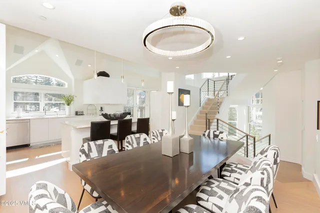 a view of kitchen and dining room with wooden floor