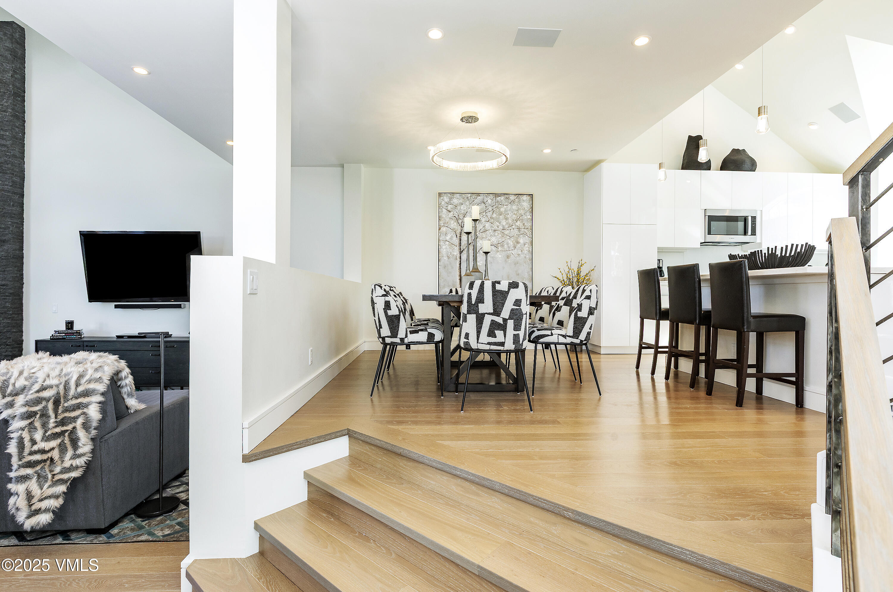 83 Offerson Road, Unit 1 Beaver Creek, CO 81620 - Photo 6 of 27 a living room with furniture and a flat screen tv