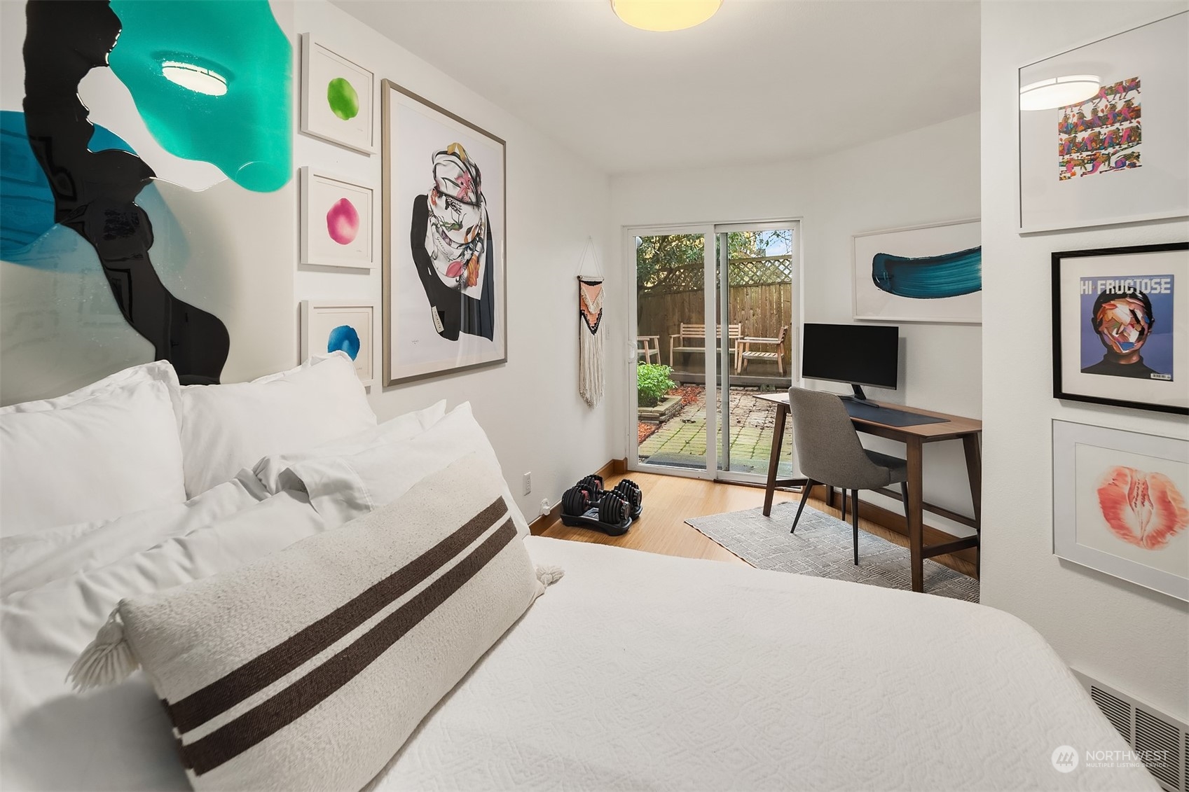 6528 34th Avenue Southwest Seattle, WA 98126 - Photo 11 of 13 a bedroom with a bed and furniture