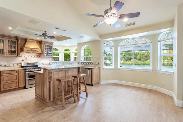 a white toilet sitting next to a bathroom sink