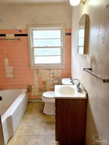 a bathroom with a sink and a bathtub