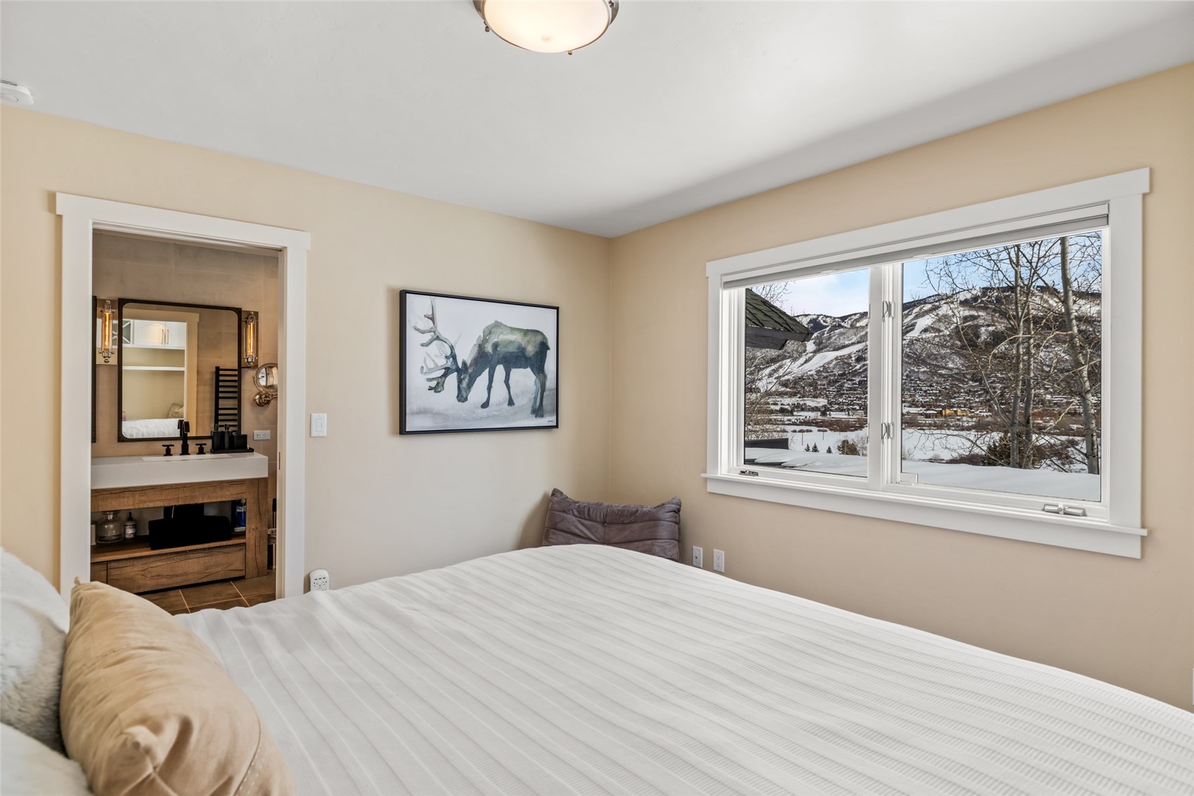 31655 Sugar Ridge Road Steamboat Springs, CO 80487 - Photo 45 of 49 a bedroom with a bed and a window