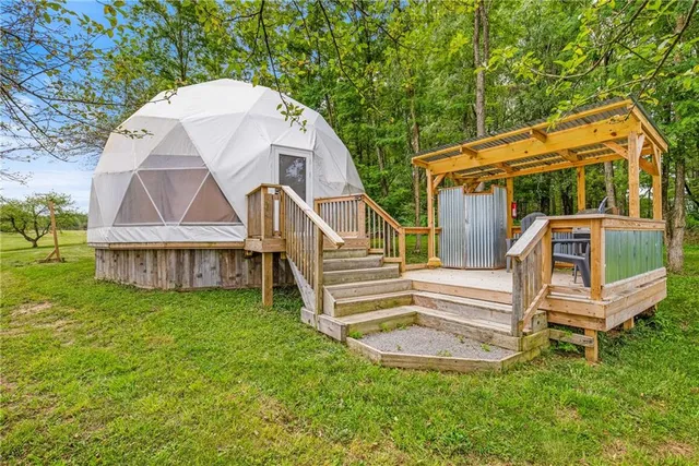 a view of entryway with wooden floor